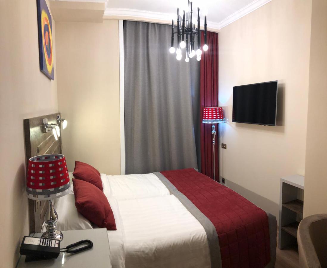 Grace Point Hotel Astana Kamer foto