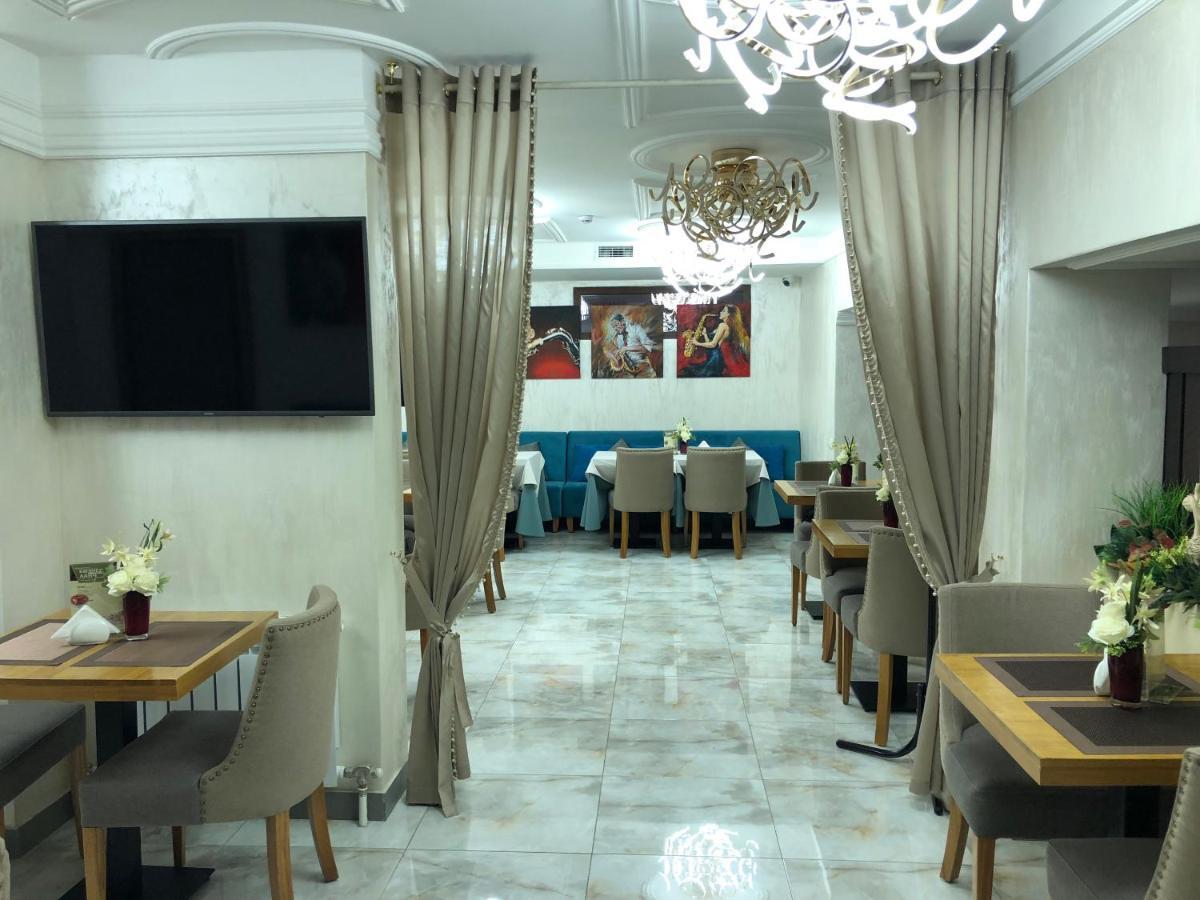 Grace Point Hotel Astana Kamer foto